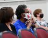 Women in meeting wearing masks