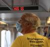 Man wearing mask on bus