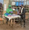 Masked seller and buyer in Kenya