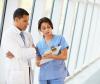 Medical consult in hospital hallway
