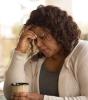 Middle-aged woman looking sad