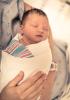Mom holding newborn