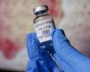 Monkeypox vaccine vial in gloved hand