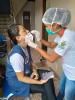 Health worker getting nasal swab
