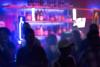 People in night club blurred image