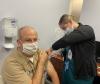 Older man getting the flu vaccine
