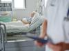 Older woman in hospital bed