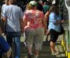 Overweight people in a crowd
