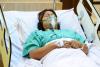 Patient with oxygen mask