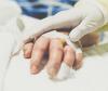 Patient hand with IV port