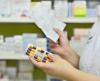 Pharmacist filling prescription