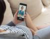 Pregnant woman consulting with doctor on phone