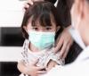 Preschool girl getting vaccinated