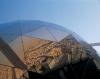 Reflection of downtown Riyadh and desert in The Globe at the top of the Faisaliah Center
