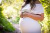 Pregnant woman in the summer