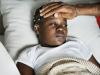 Sick girl in bed