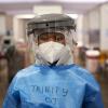 South African occupational therapist wearing protective equipment