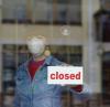Store with closed sign