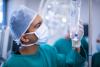 Surgeon with IV