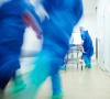 Surgeons rushing in hallway
