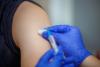 Syringe with needle and biceps