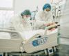 Medical team caring for COVID patient
