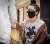 Teen getting COVID vaccine