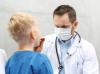 Throat exam of young boy