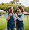 Twin girls with ice cream bars