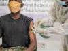 Ugandan soldier getting vaccinated
