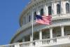 US Capitol with flag