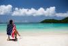 US woman on beach