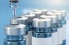 Vaccine vials and syringe