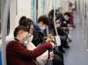 Wearing masks and respirators on China subway
