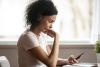 Woman checking smartphone