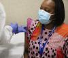 Woman gettnig COVID vaccine