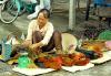 Woman selling chickens