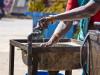 Washing hands at outside sink