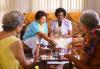 Women playing cards in nursing home