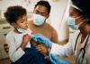 Young boy getting nasal swab
