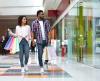 Young couple shopping in mall