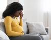 Pregnant woman on couch