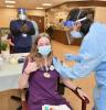 Young woman getting COVID vaccine