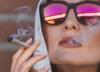 Woman smoking marijuana joint