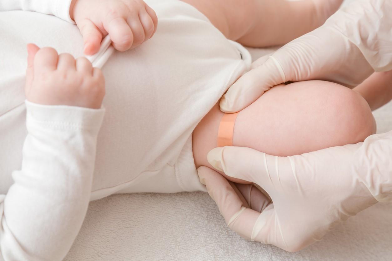Vaccine BandAid on baby