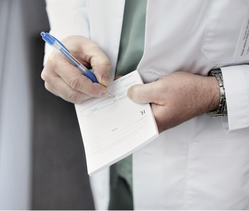 Doctor writing a prescription